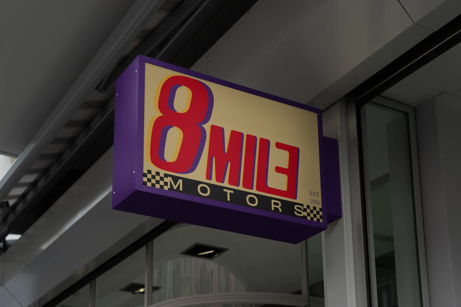 8 Mile Motors red, gold and purple logo applied to a projecting sign mockup.